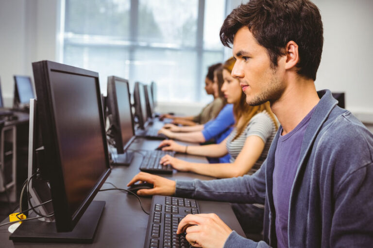 Focused student in computer class at the university