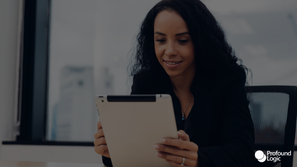 Woman checking something in her tablet for work