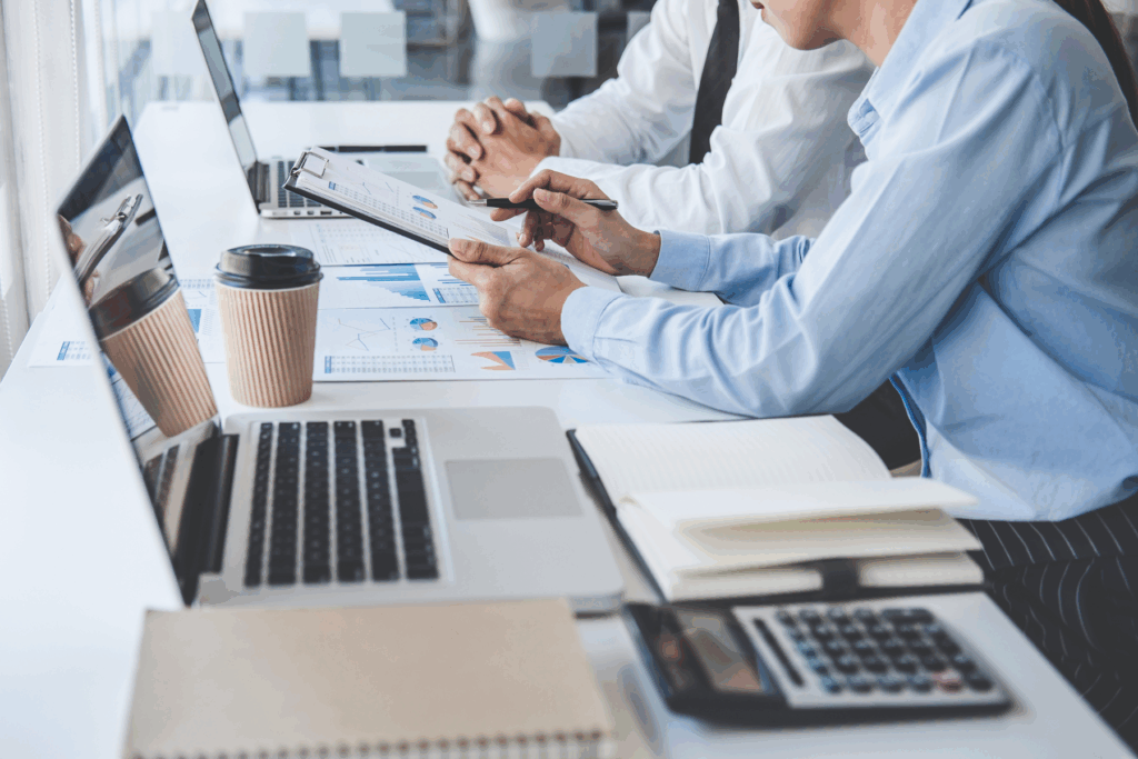 two people working together to solve problems